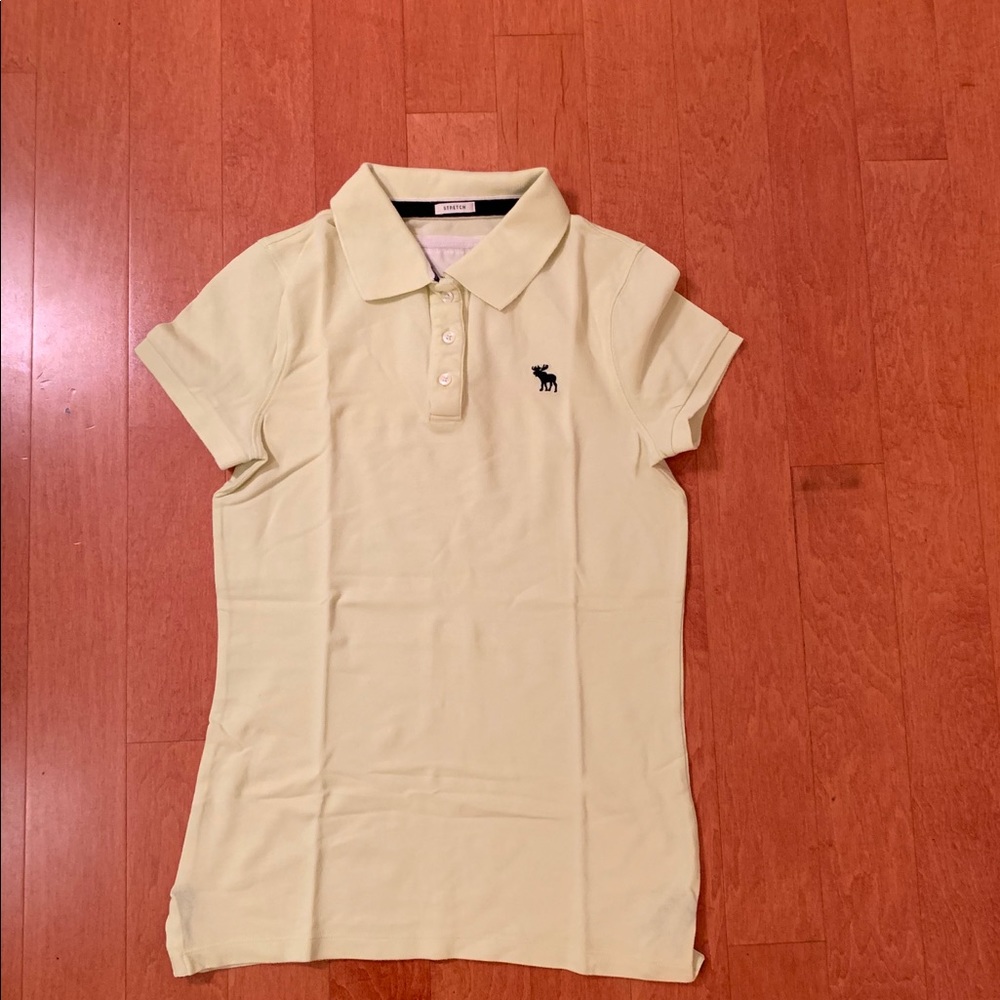 Abercrombie and Fitch polo collared shirt, pastel yellow, size medium